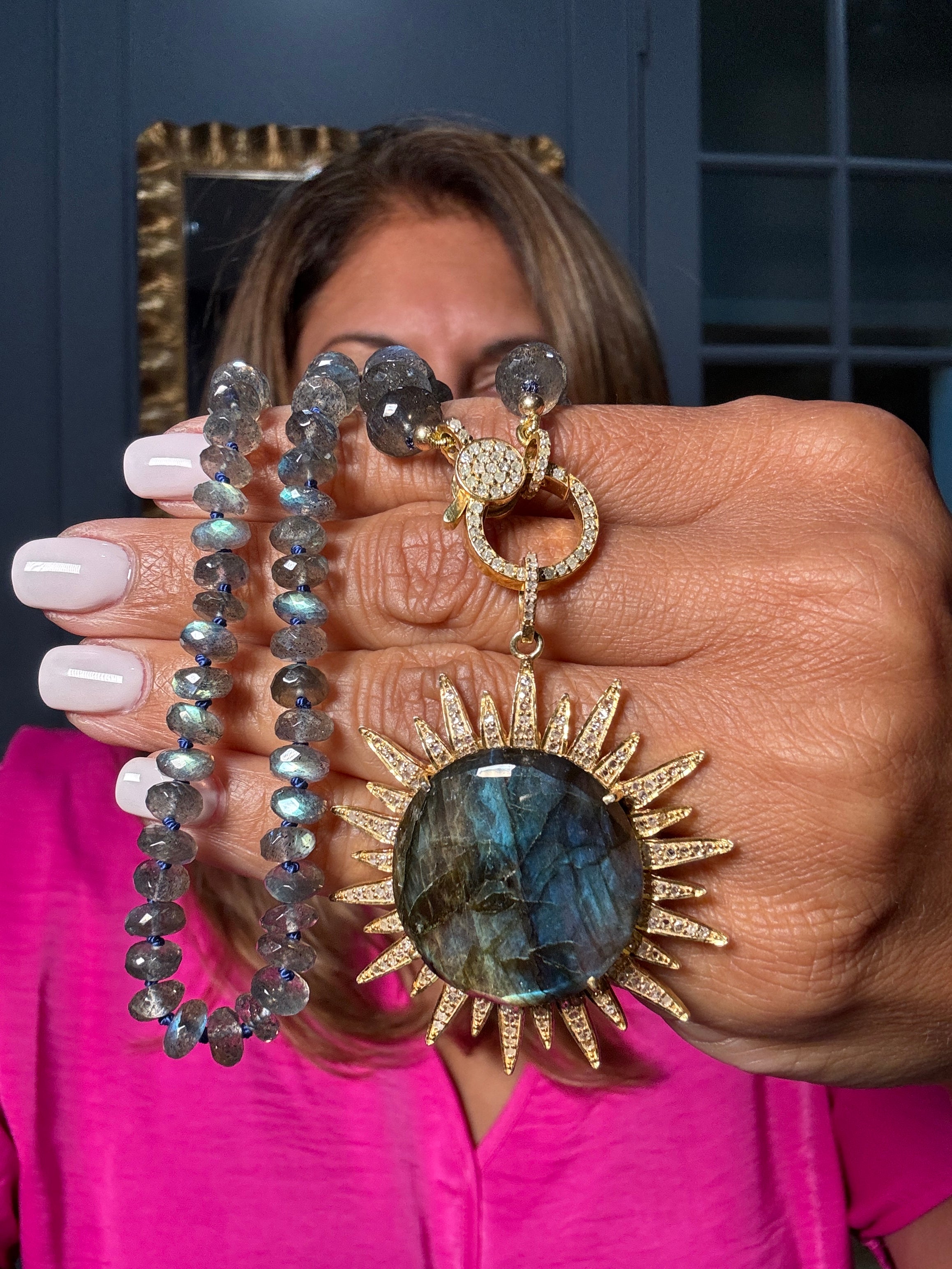 Faceted gray labradorite necklace with gold pavé diamond clasp and round labradorite sunburst pendant — a luminous, one-of-a-kind Ulka Rocks design with bold polish.