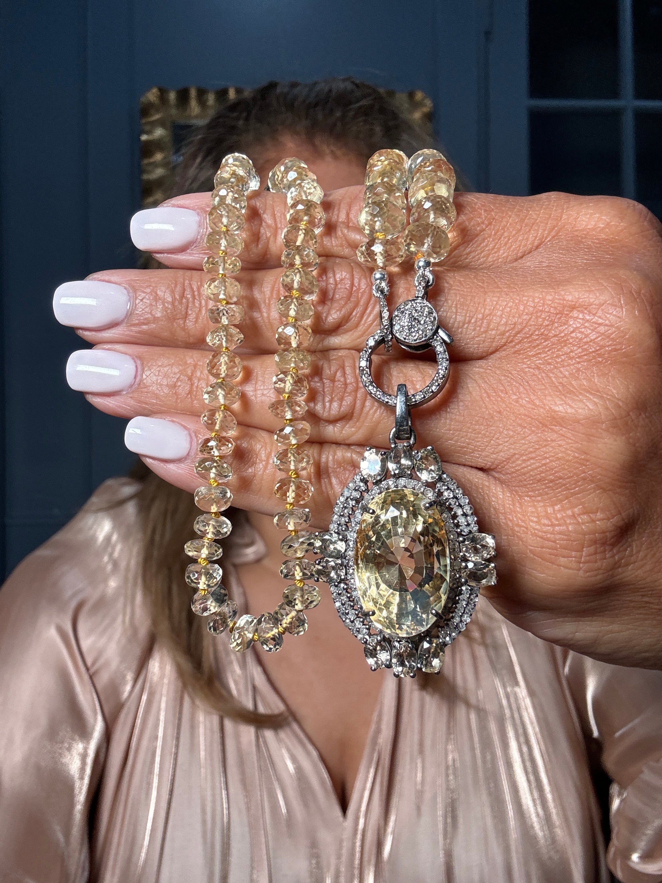18” scapolite necklace in soft sunshine tones, paired with a sparkling citrine pendant framed in a double pavé diamond halo and accented with scapolite. A radiant Ulka Rocks original.