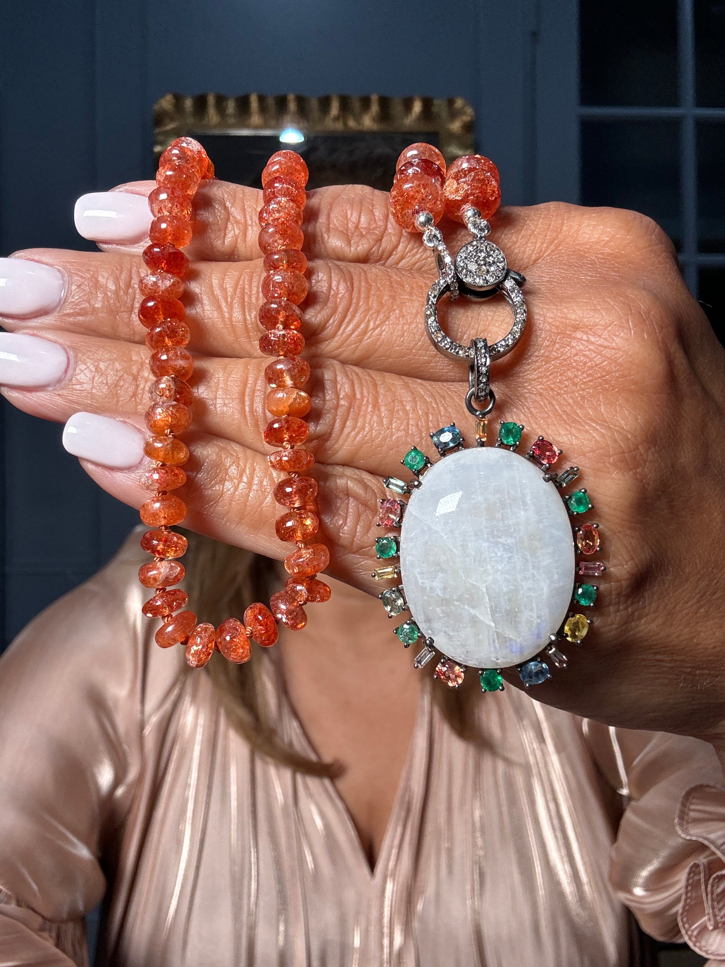 Glowing sunstone necklace with a rainbow halo moonstone pendant, set in sterling silver with pavé diamonds — a one-of-a-kind Ulka Rocks piece blending warmth and light.