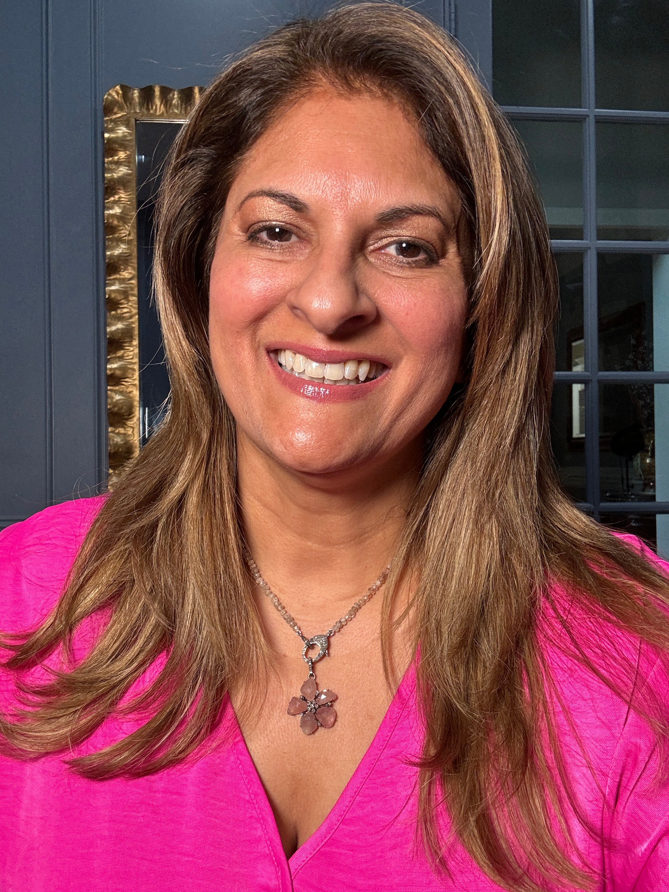 Faceted zircon necklace with a pink sapphire flower pendant, set in sterling silver with a diamond clasp. A floral-inspired Ulka Rocks original designed for effortless style.