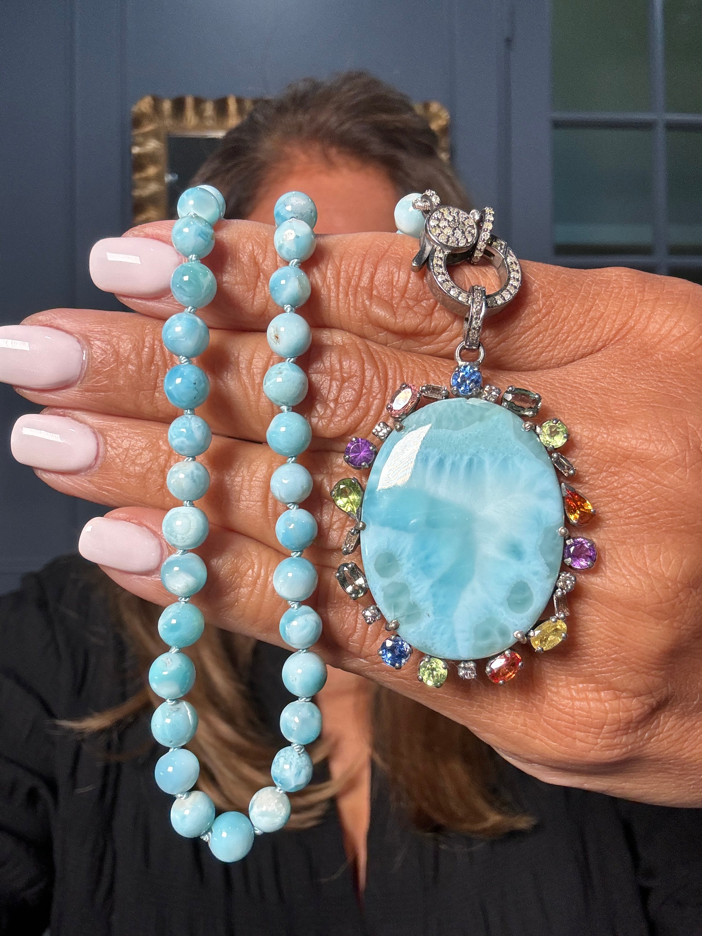 Larimar bead necklace with a large oval pendant framed in multicolored sapphires and diamonds. Features a sterling silver pavé clasp. Ulka Rocks exclusive.