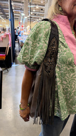 Heritage Brand Marilyn bag No. 1370 worn on the shoulder at the Dallas show