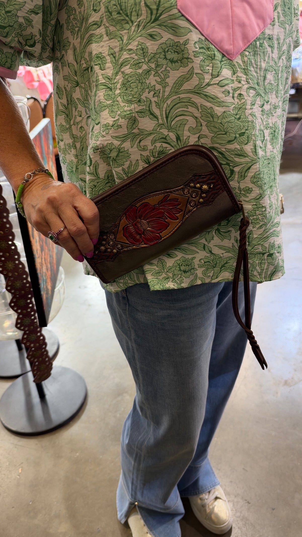 Heritage Brand wallet carried as a clutch at the Dallas show