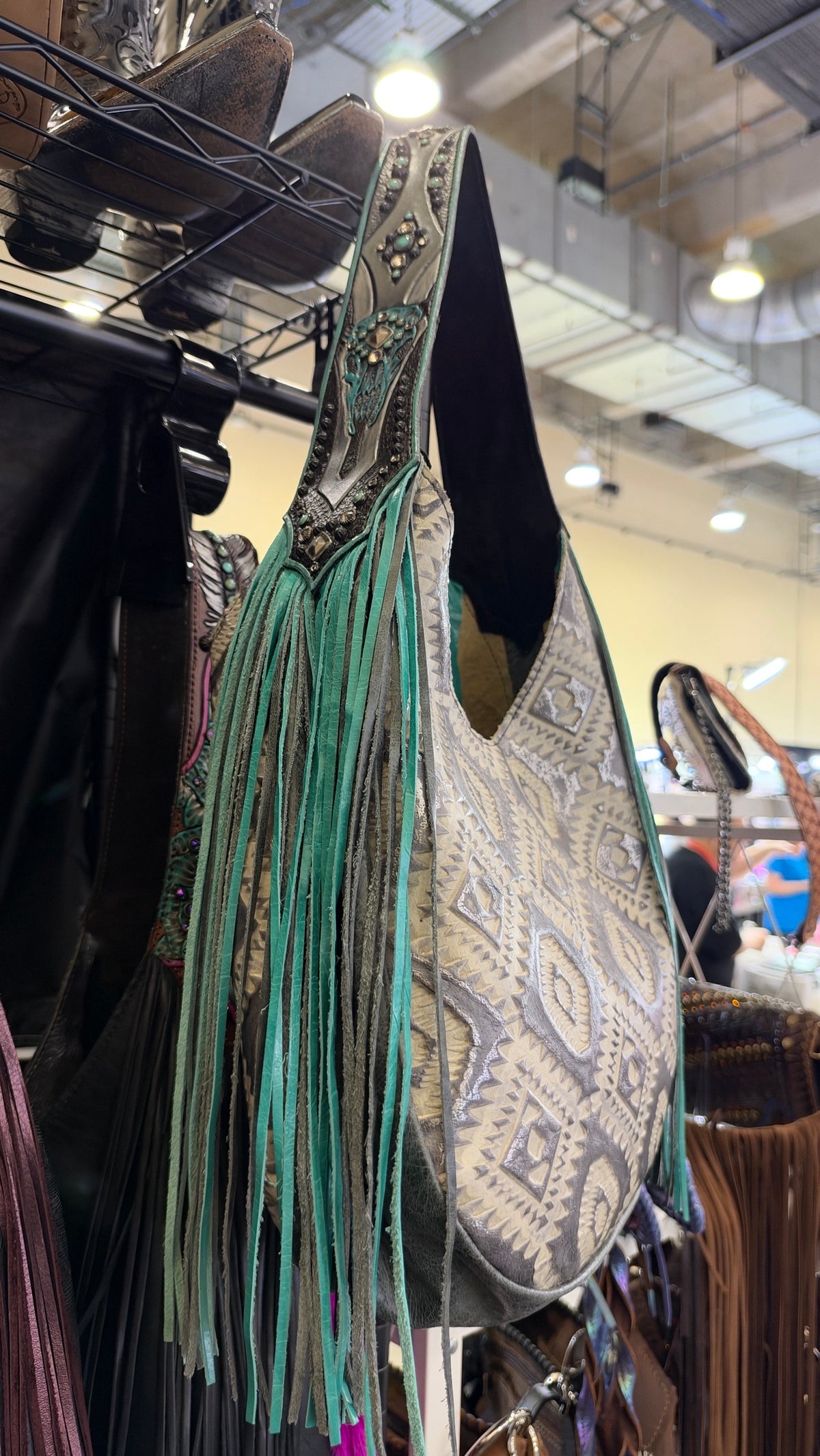 Heritage Brand bag No. 3818, turquoise fringe and tooled strap close up