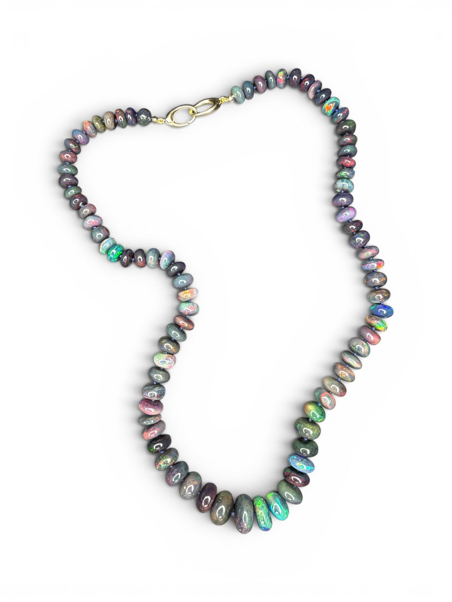 Australian black opal beads showing rare play of color and internal fire