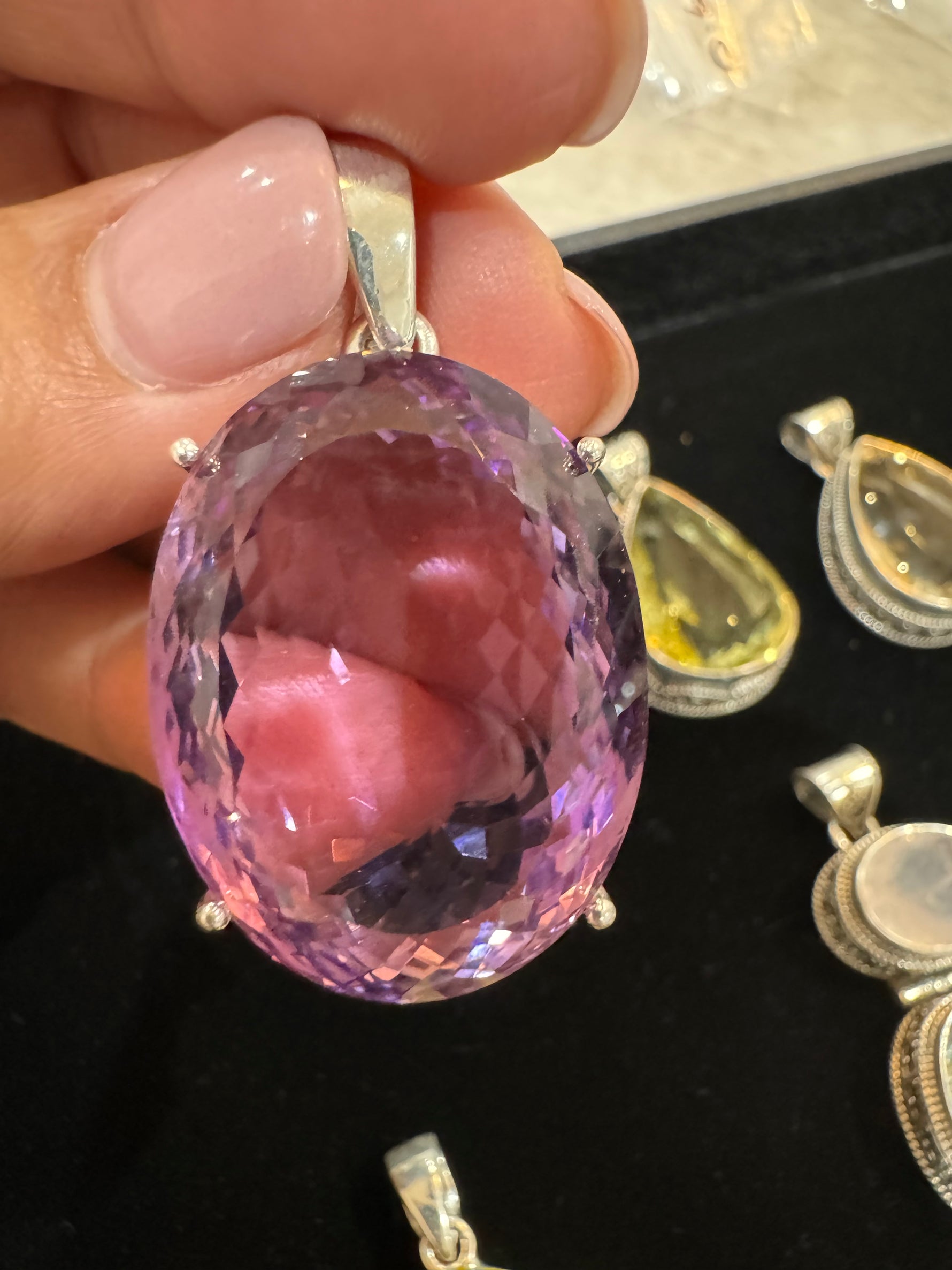 Amethyst and Citrine and Diamond pendant alternate angle showing natural stone variation