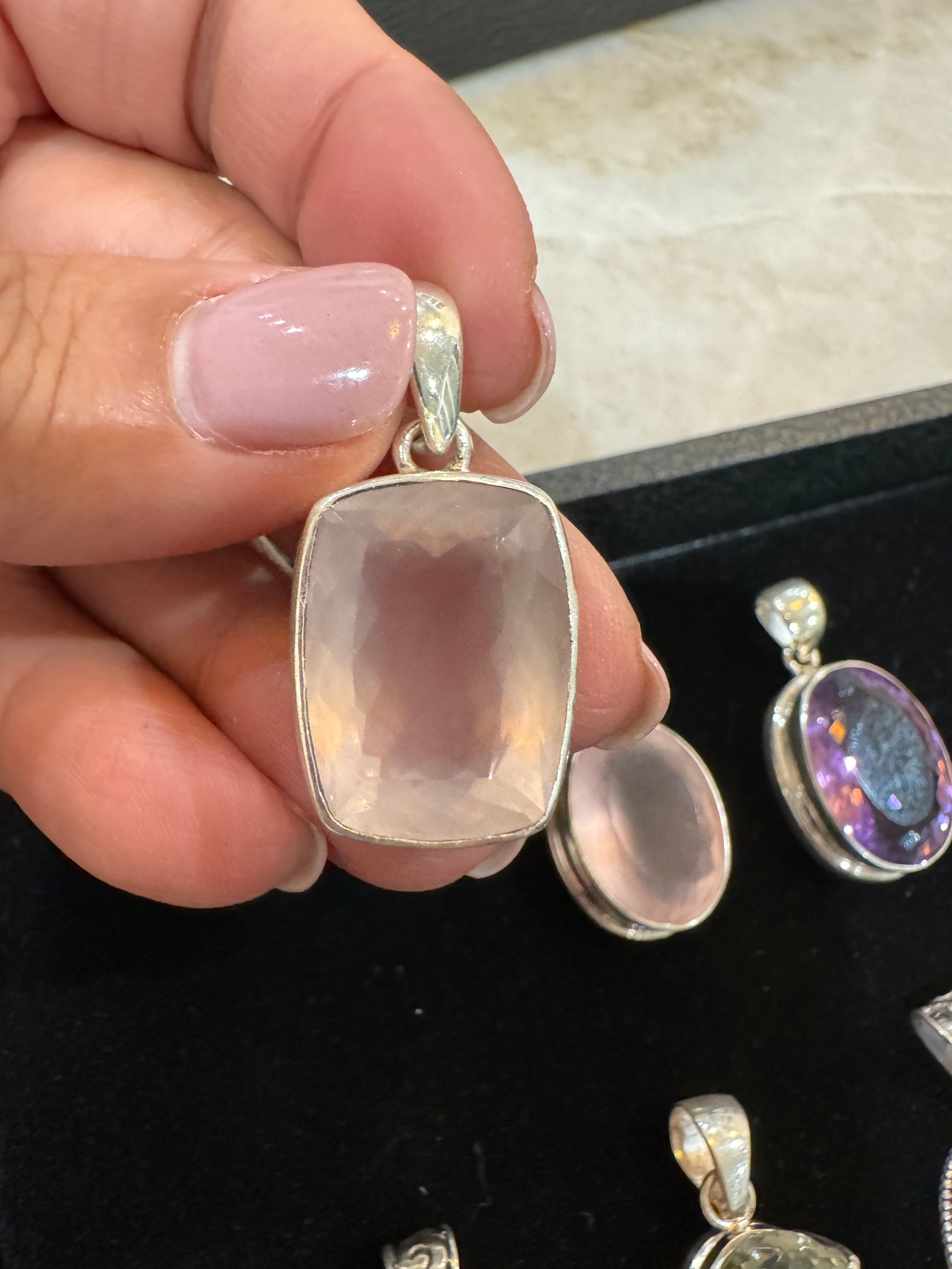 Amethyst and Citrine and Diamond pendant alternate angle showing natural stone variation