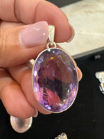 Amethyst and Citrine and Diamond pendant alternate angle showing natural stone variation