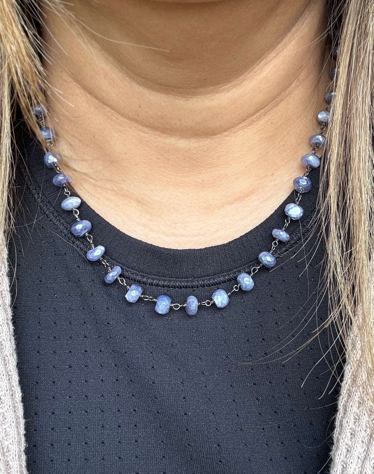 Detail view of Moonstone necklace showing gemstone color and texture