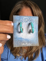 Turquoise jewelry styled for wear showing scale and drape