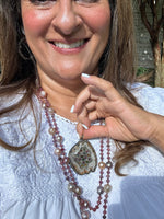 Diamond and Opal pendant styled for wear showing scale and drape