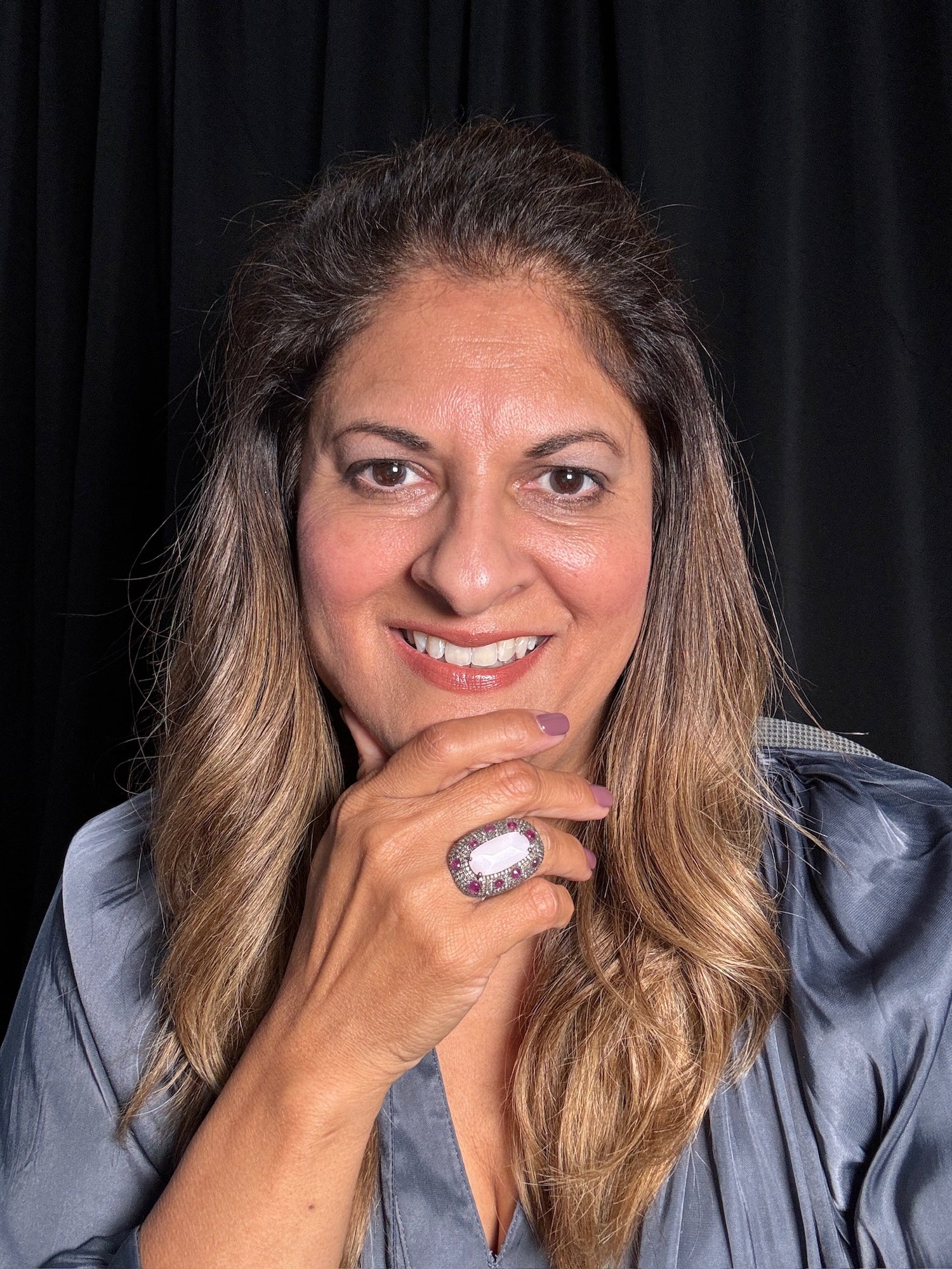 Detail view of Pink Opal and Diamond and Ruby ring showing gemstone color and texture