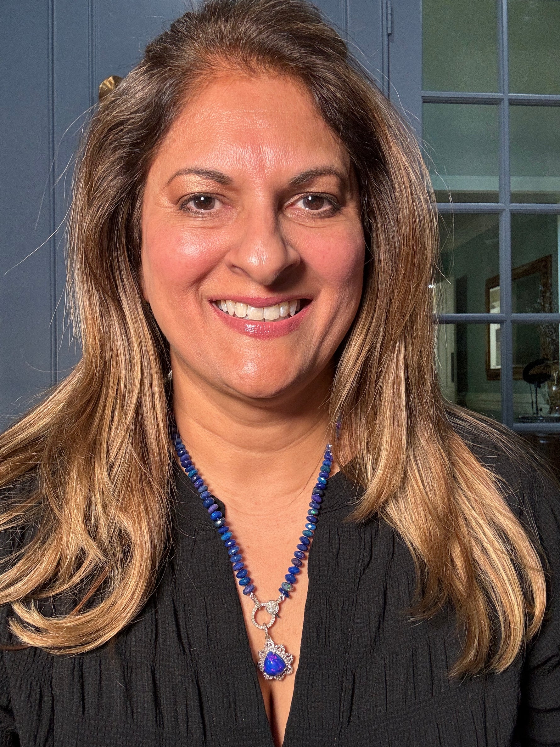 Detail view of Diamond and Opal necklace pendant combo showing gemstone color and texture