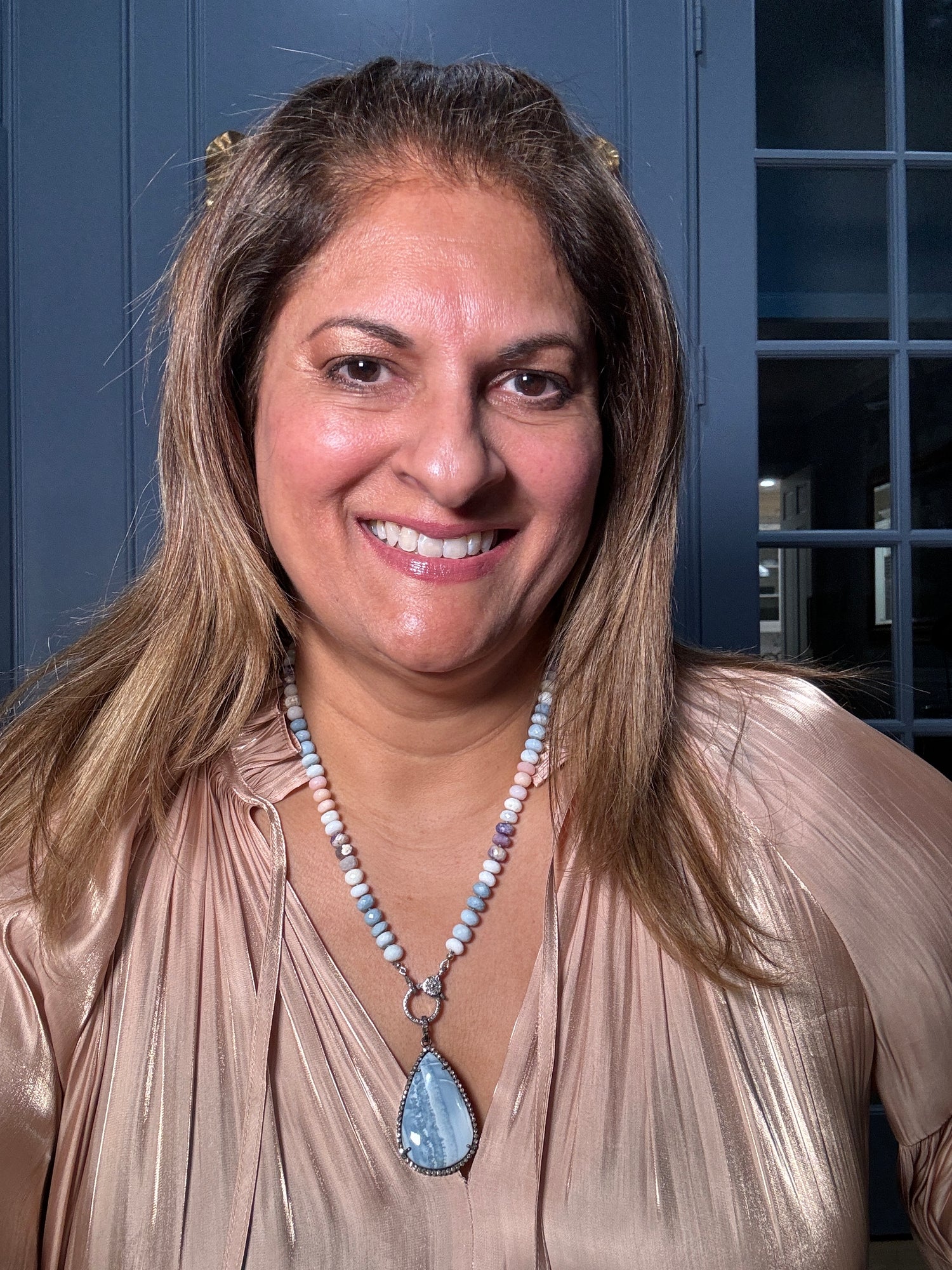 Detail view of Diamond and Opal necklace pendant combo showing gemstone color and texture