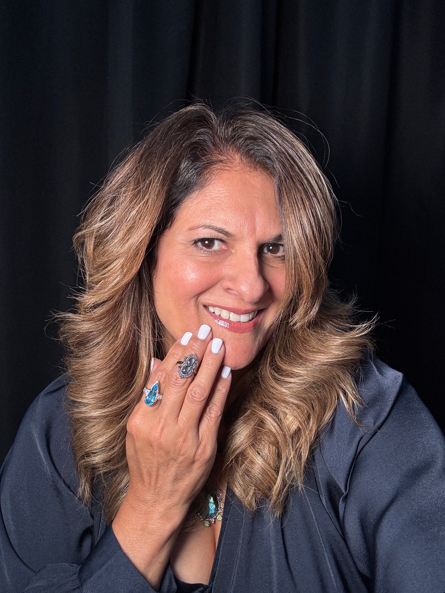 Detail view of Aquamarine and Diamond ring showing gemstone color and texture