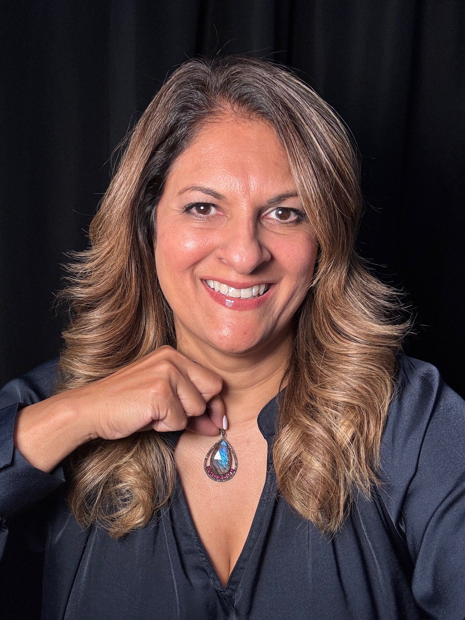 Detail view of Diamond and Labradorite and Ruby necklace showing gemstone color and texture