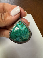 Opal jewelry alternate angle showing natural stone variation
