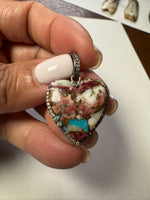 Opal jewelry alternate angle showing natural stone variation