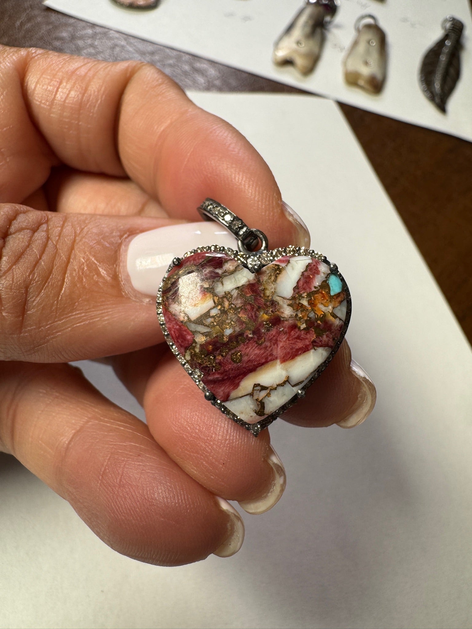 Opal jewelry alternate angle showing natural stone variation