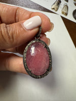 Opal jewelry alternate angle showing natural stone variation