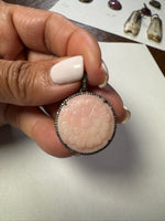 Opal jewelry alternate angle showing natural stone variation