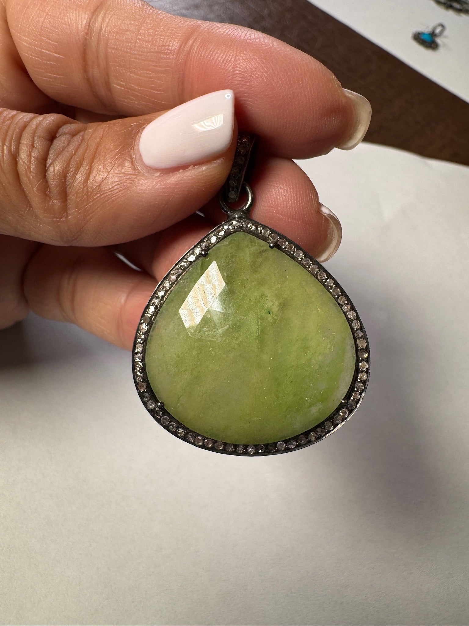 Opal jewelry alternate angle showing natural stone variation
