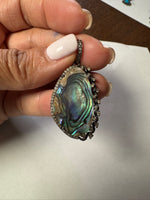 Opal jewelry alternate angle showing natural stone variation
