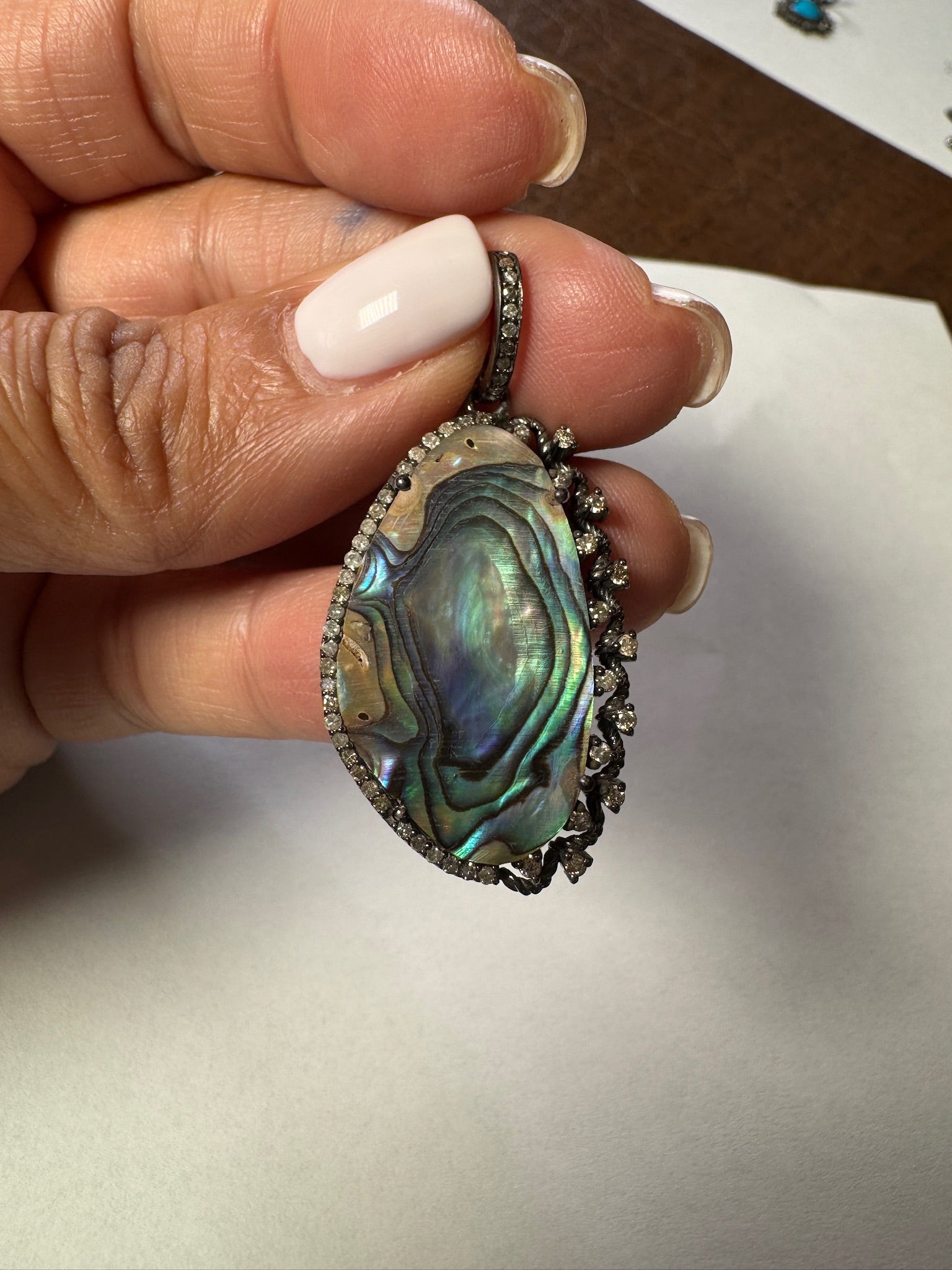 Opal jewelry alternate angle showing natural stone variation