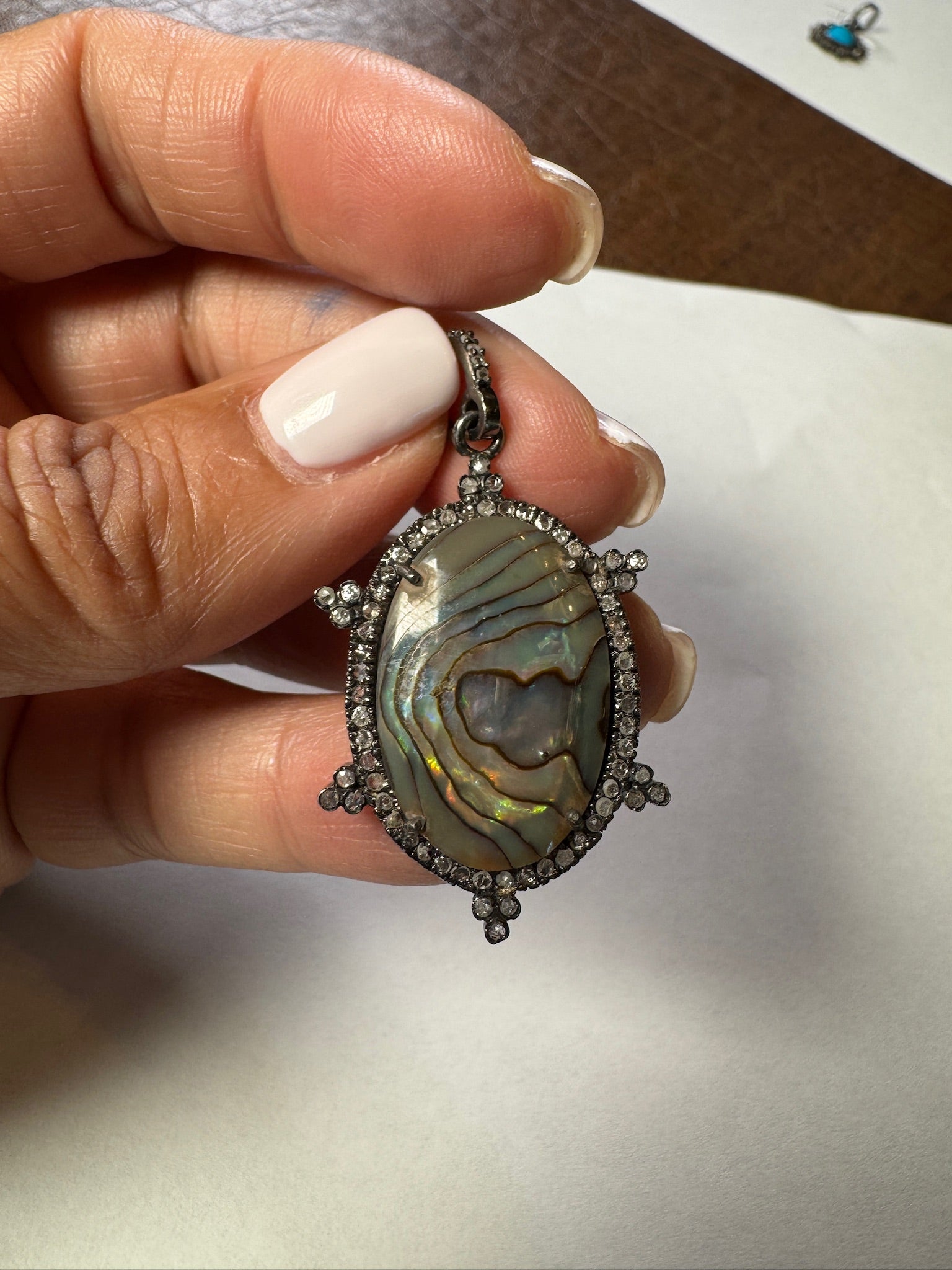 Opal jewelry alternate angle showing natural stone variation