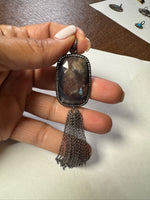 Opal jewelry alternate angle showing natural stone variation