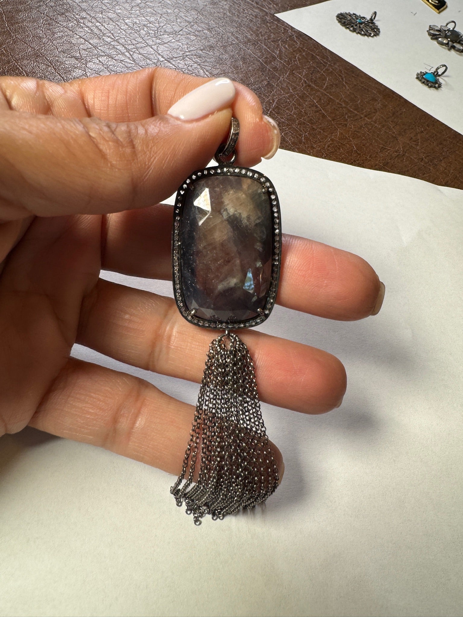 Opal jewelry alternate angle showing natural stone variation