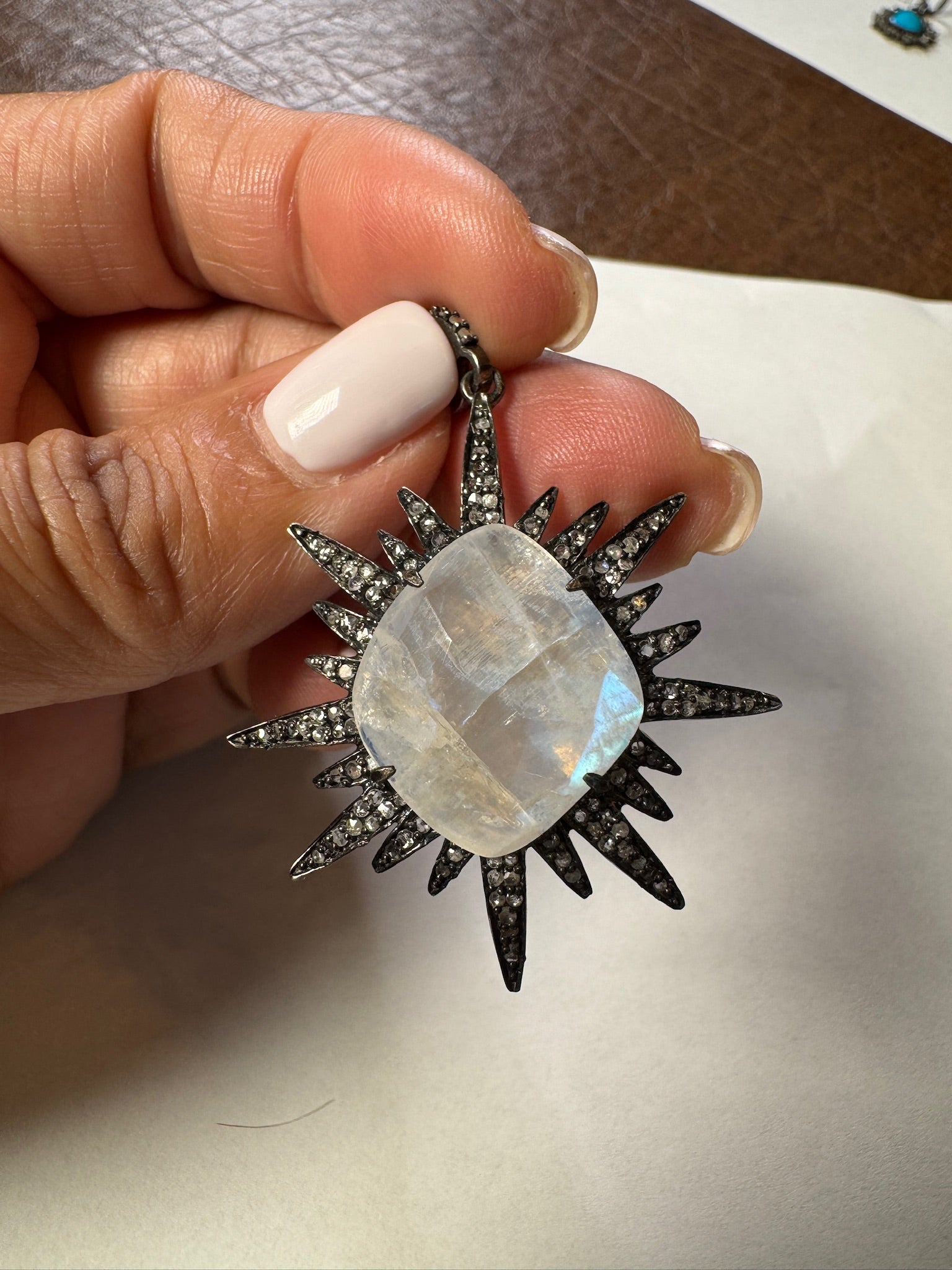 Opal jewelry alternate angle showing natural stone variation