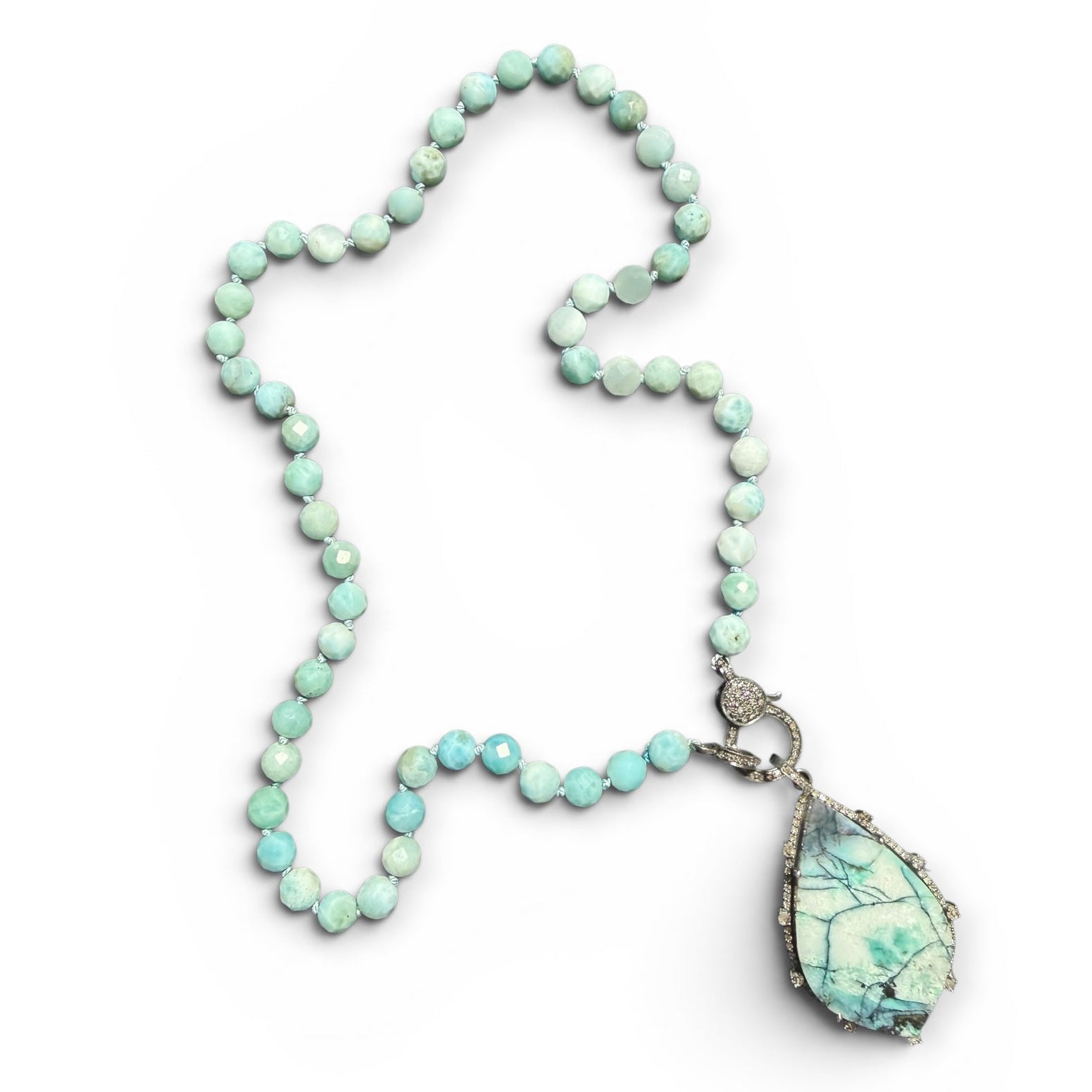 Larimar beaded necklace with a large teardrop pendant on a white background