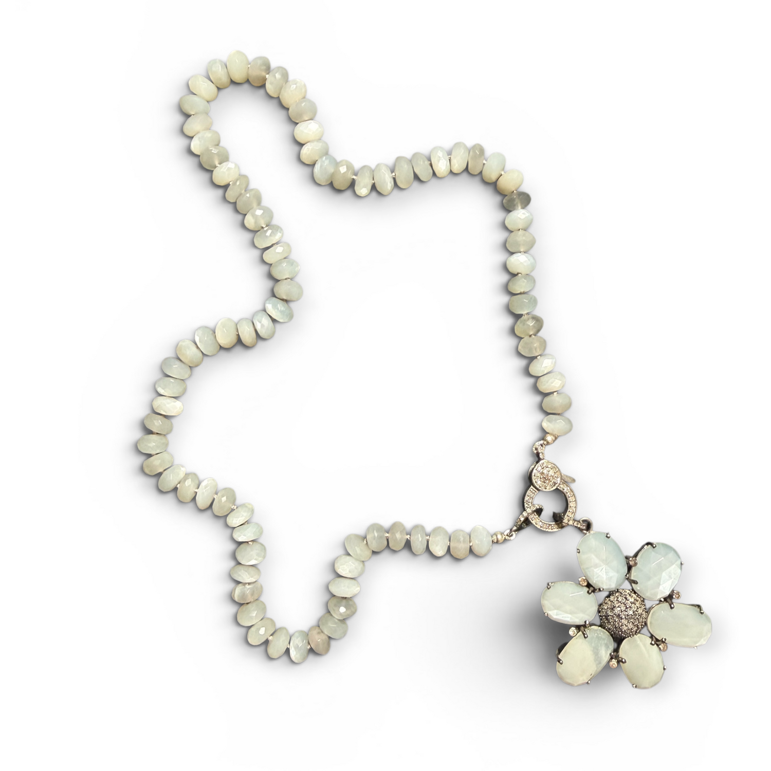 Necklace with a floral pendant on a white background