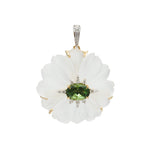 Carved rock crystal flower pendant with green tourmaline center and diamond accents in 18K gold | Ulka Rocks