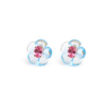 Carved blue topaz flower stud earrings with pink tourmaline centers in 14K gold | Ulka Rocks