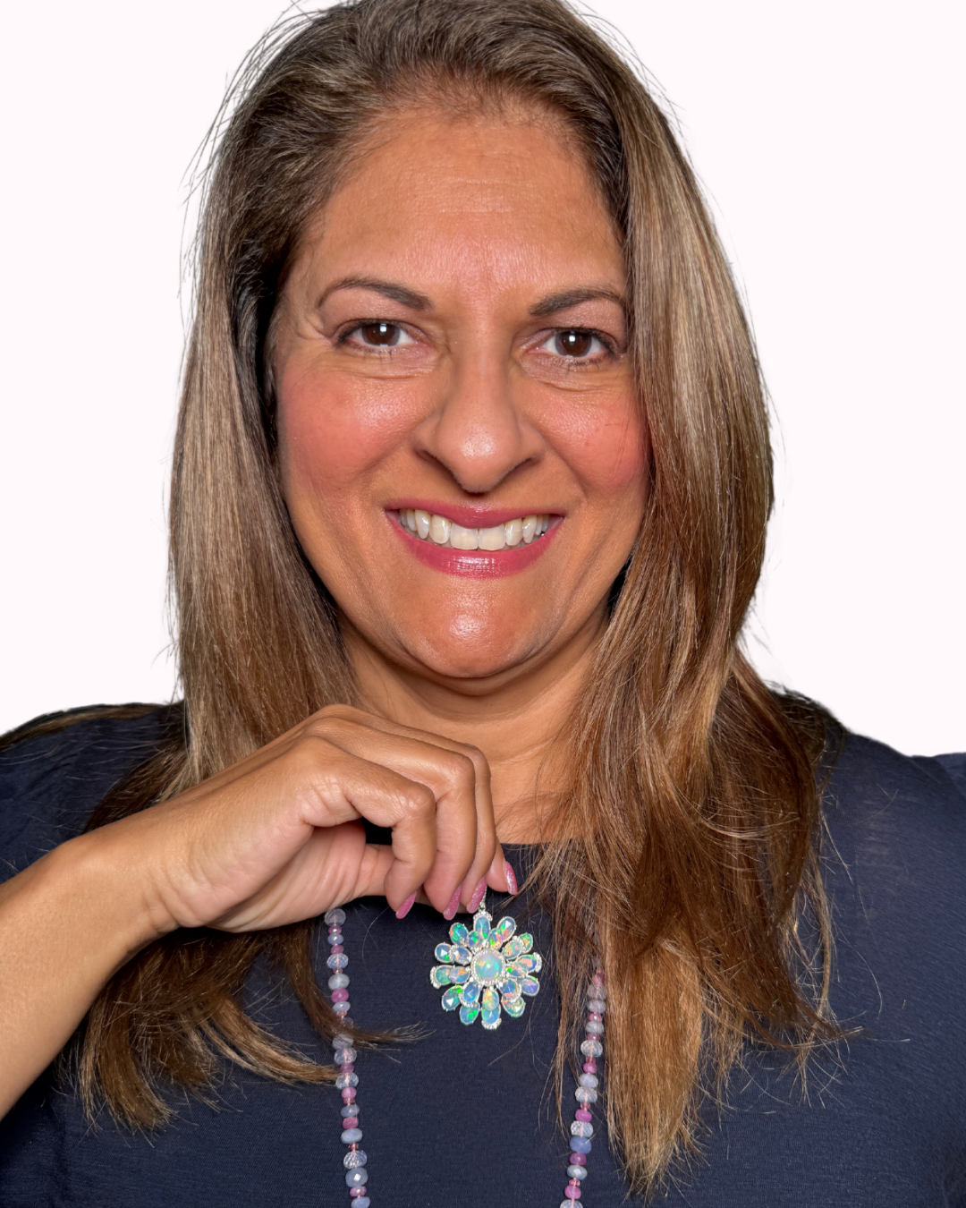 Detail view of Ethiopian Opal and Diamond jewelry showing gemstone color and texture