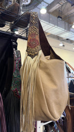 Heritage Brand bag, red poppy tooled strap and champagne fringe close up