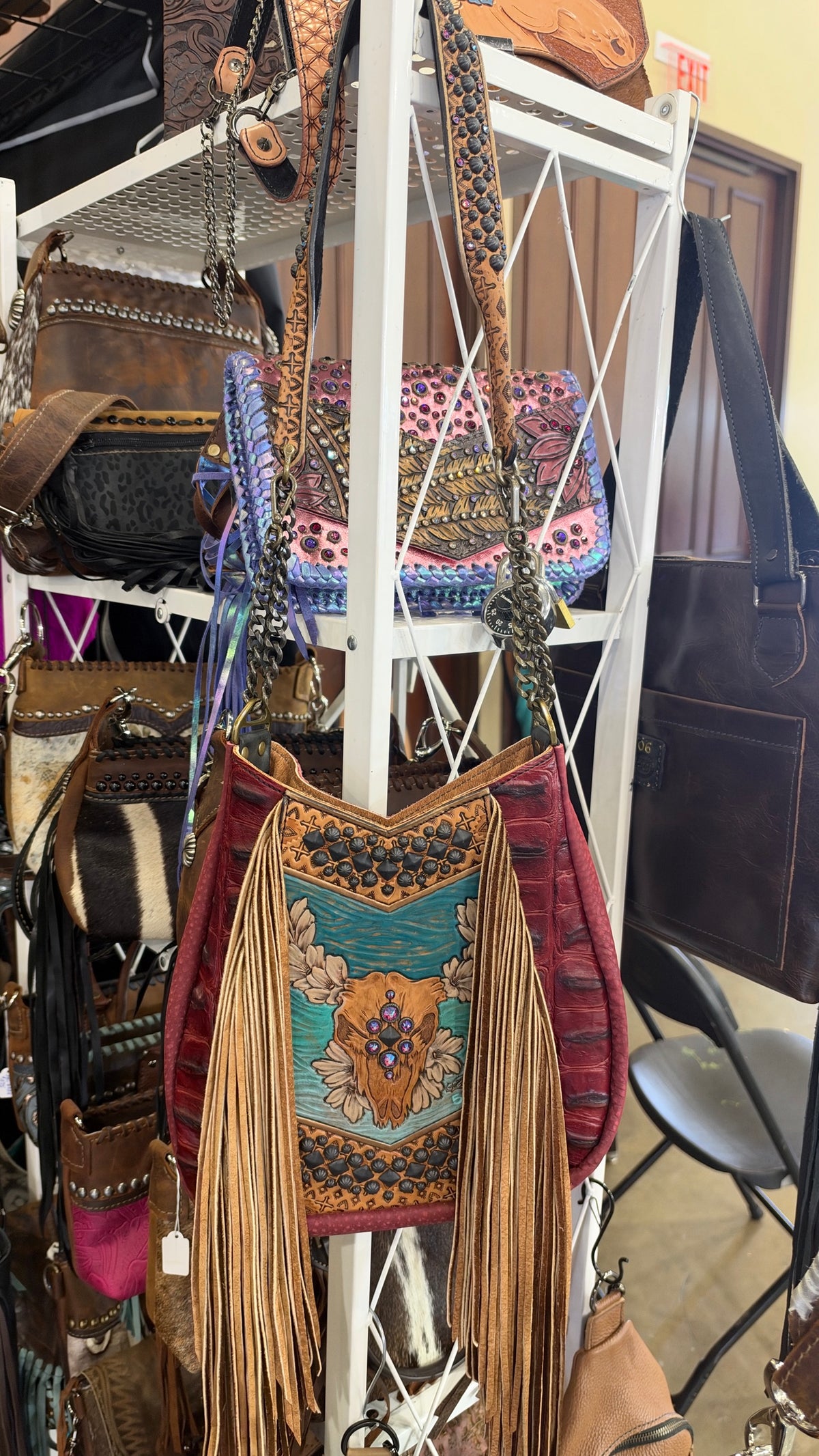 Heritage Brand Marilyn bag, tooled steer skull on turquoise with black studs, red leather and tan fringe