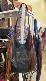 Heritage Brand Marilyn bag, distressed black leather hobo with cognac fringe and tooled sunflower strap
