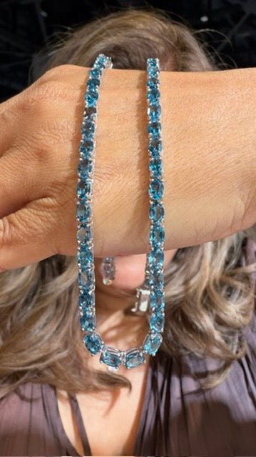 Sterling silver blue topaz tennis necklace