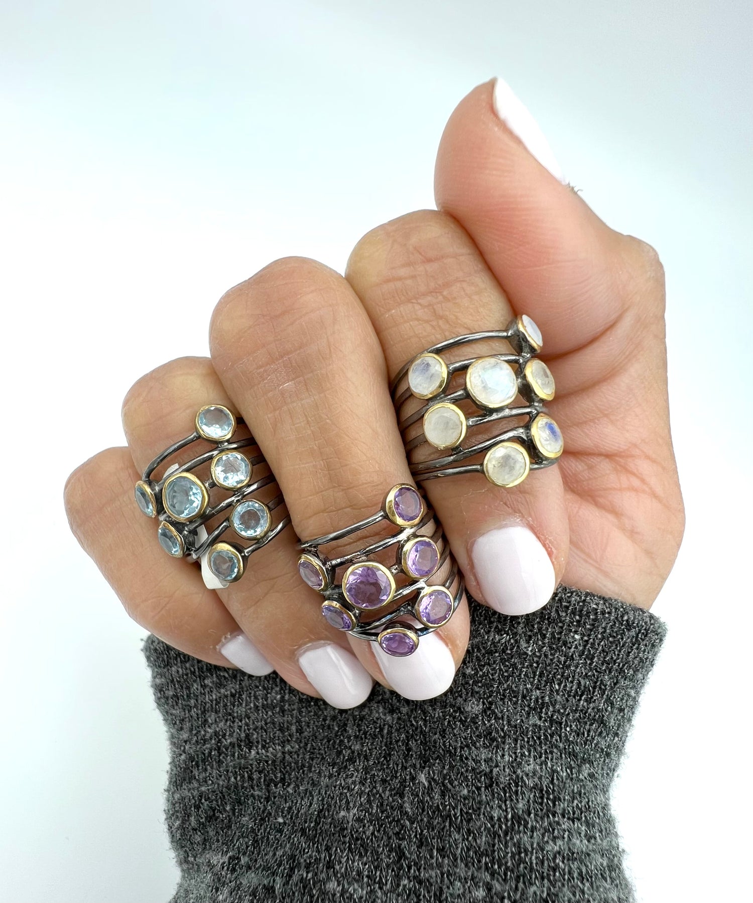 Detail view of Chalcedony and Labradorite and Moonstone ring showing gemstone color and texture