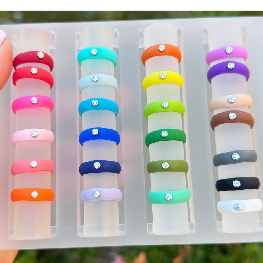 Silicone band colors, each with a bezel set diamond
